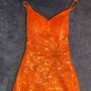 Orange sequin mini dress
